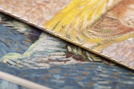 A close-up of a textured canvas showcasing intricate brushwork.