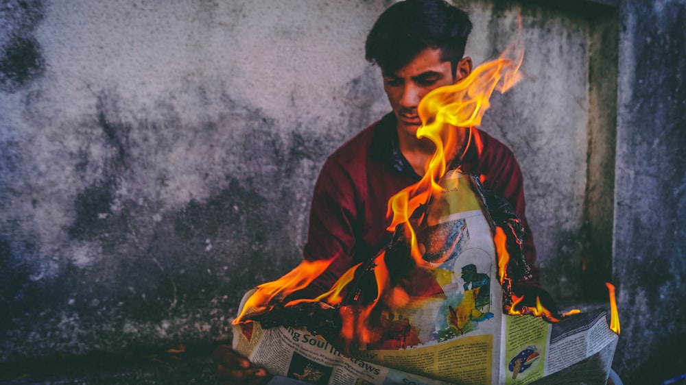 man holding newspaper