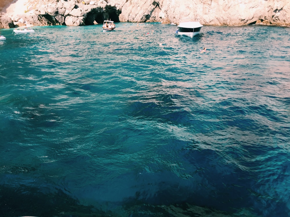 body of water and cave