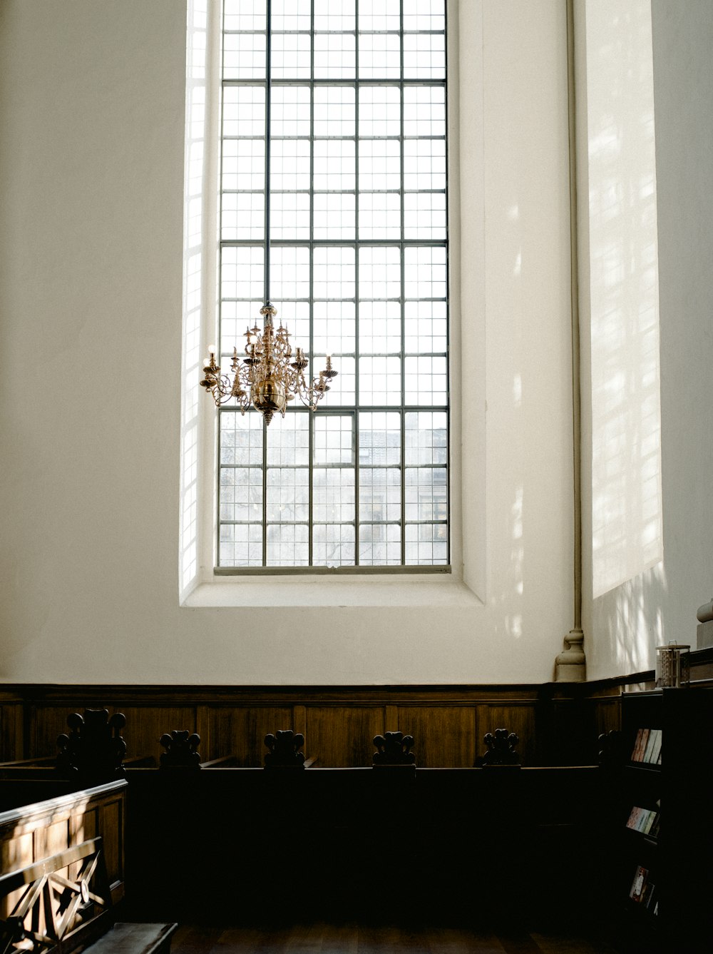 chandelier near glass window