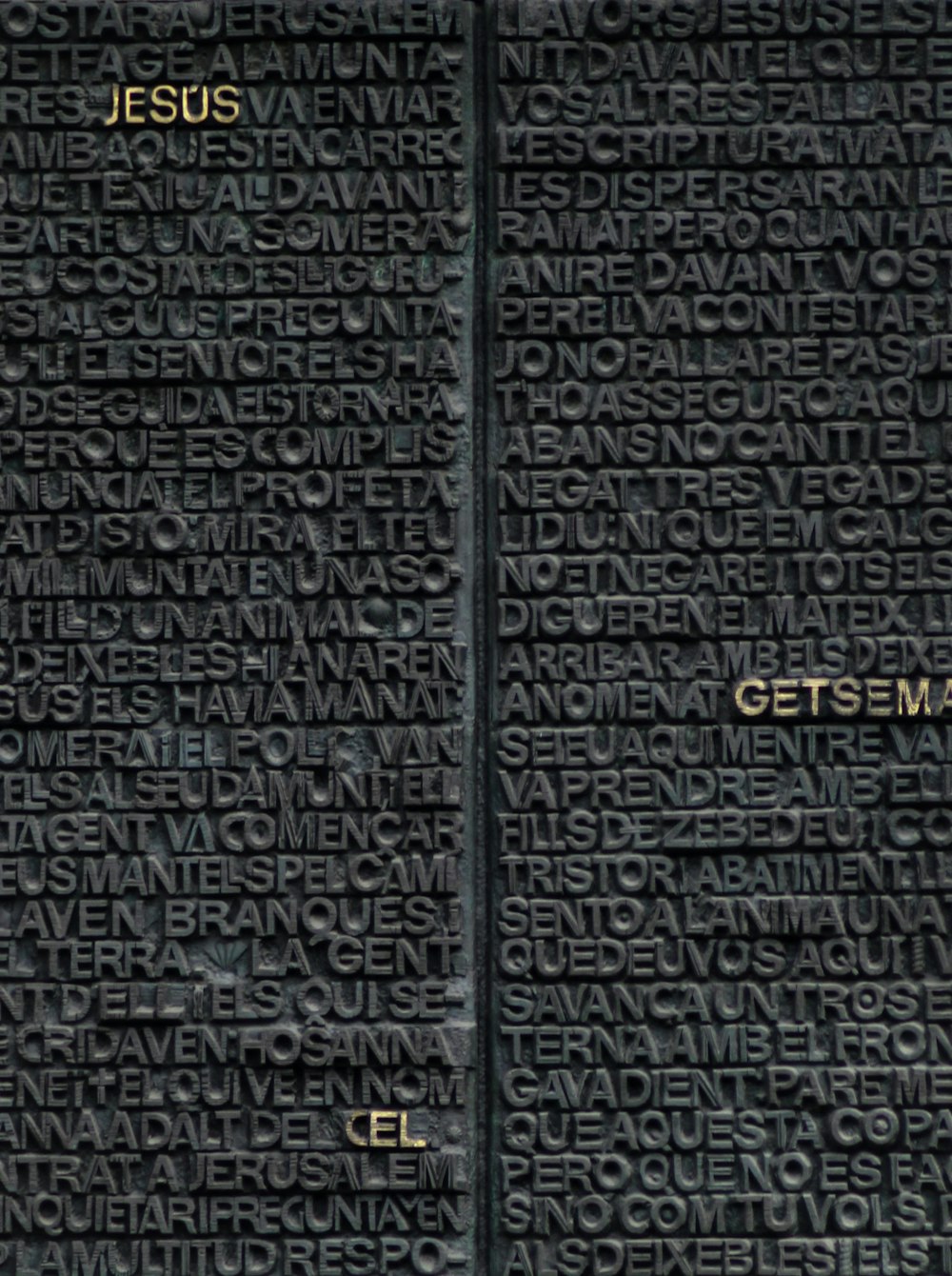 a black wall with words written on it