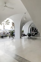 An elegant patio area surrounded by carefully designed landscaping.