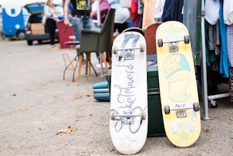 two white and beige skateboards