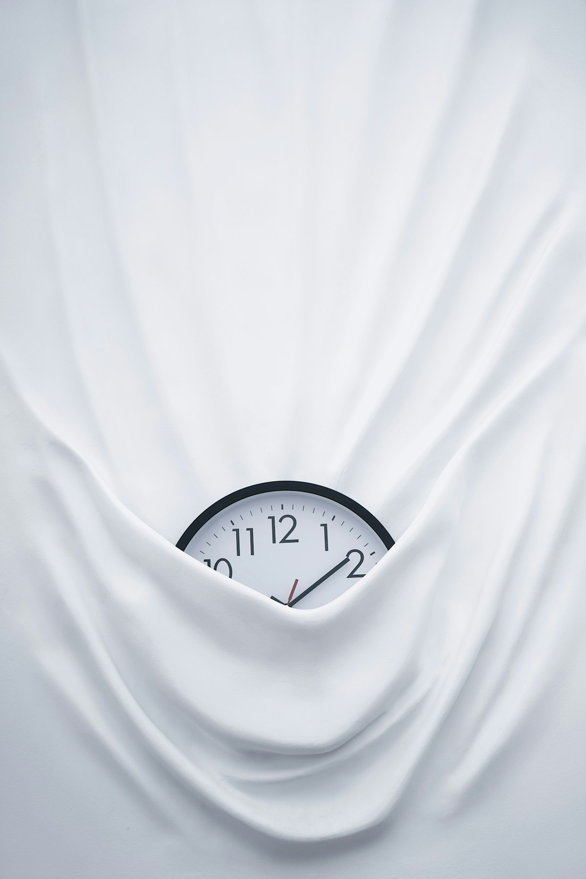 Time concept - clock under fabric