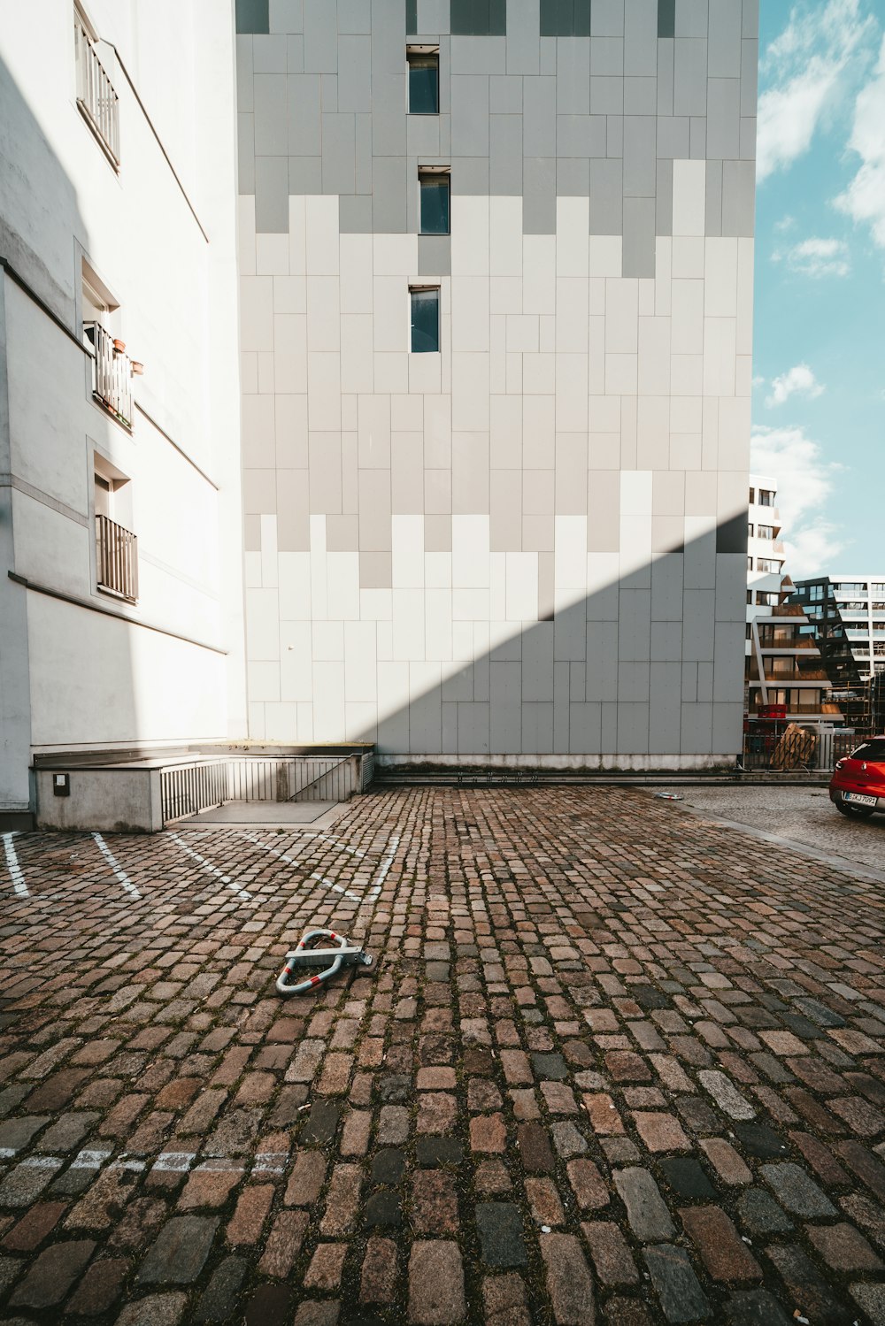 brick flooring beside wall