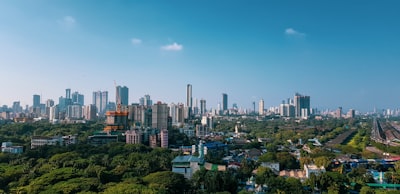high-rise buildings during daytime mumbai google meet background