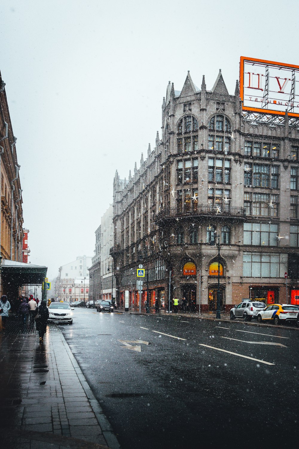 people walking on sidewalk