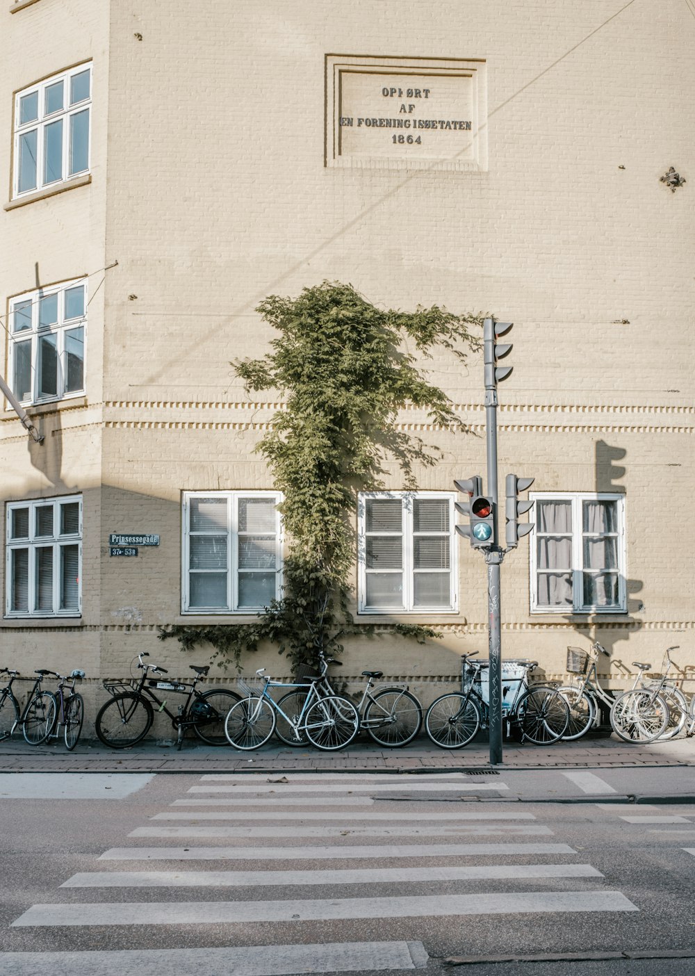bicycles beside on brown concrete building