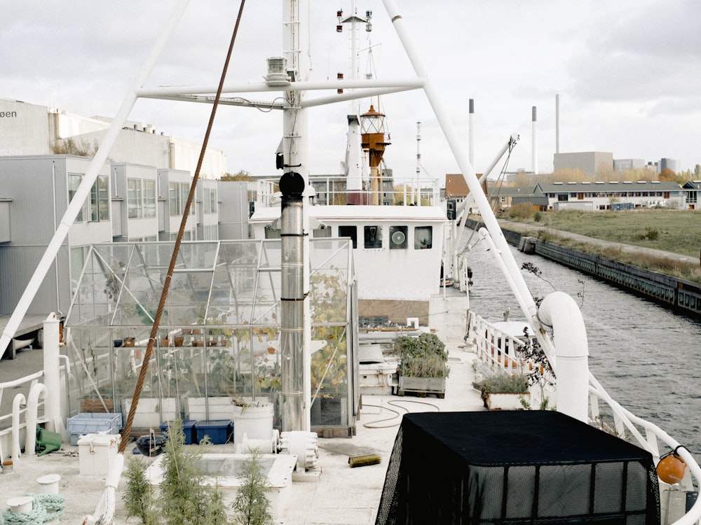 white passenger boat on river