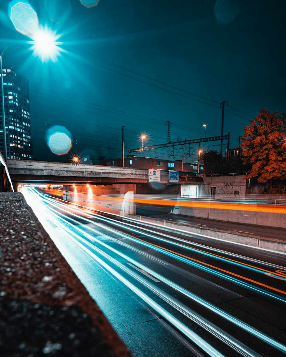 time lapse photography of cars on road