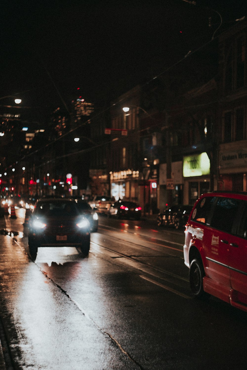 black and gray vehicle on black pavement traffic road