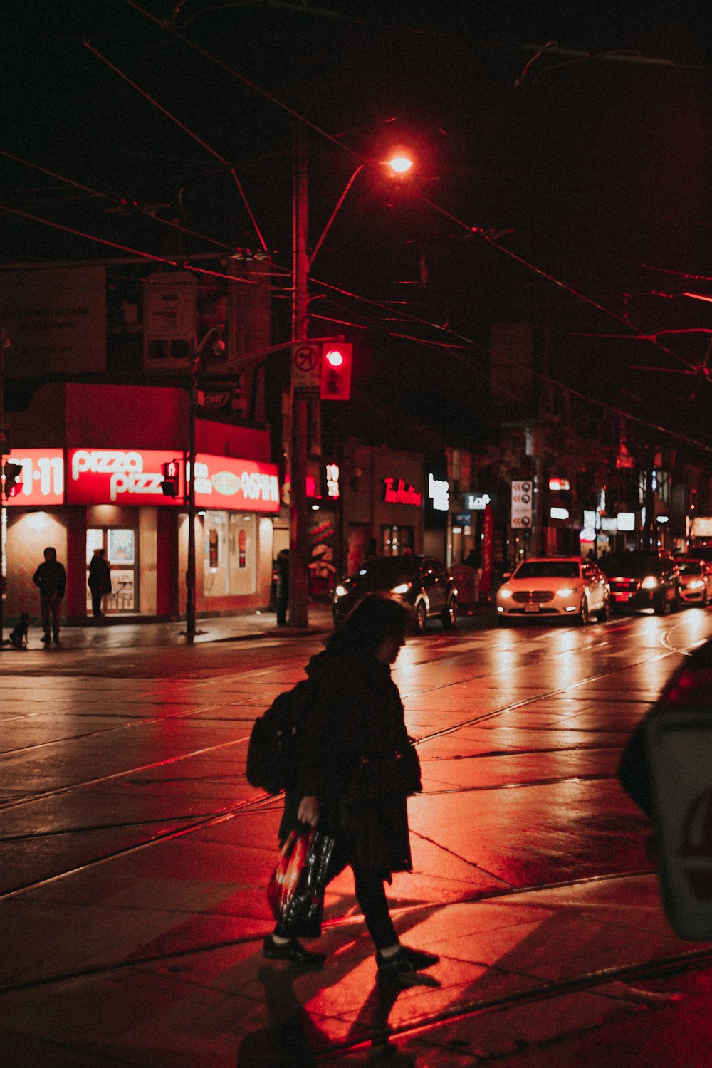 silhouette of person in street during daytime