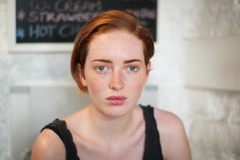 woman wearing black tank top