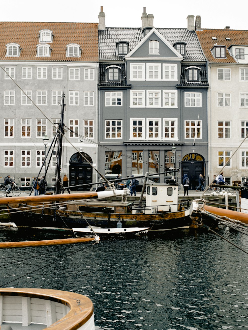 boat docked on near buildings