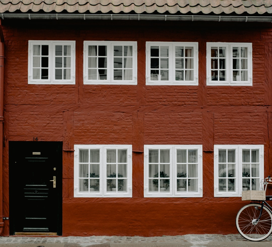 brown and white concrete 2-story building