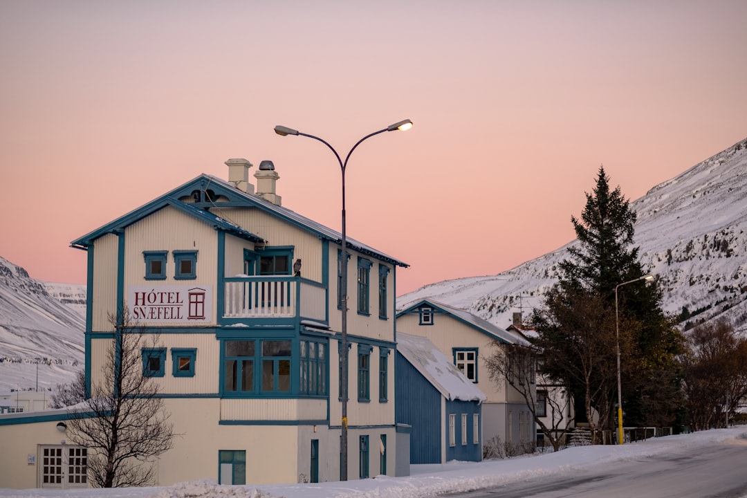 a hotel in the middle of a snowy mountain, Winter arrived in Seyðis.
