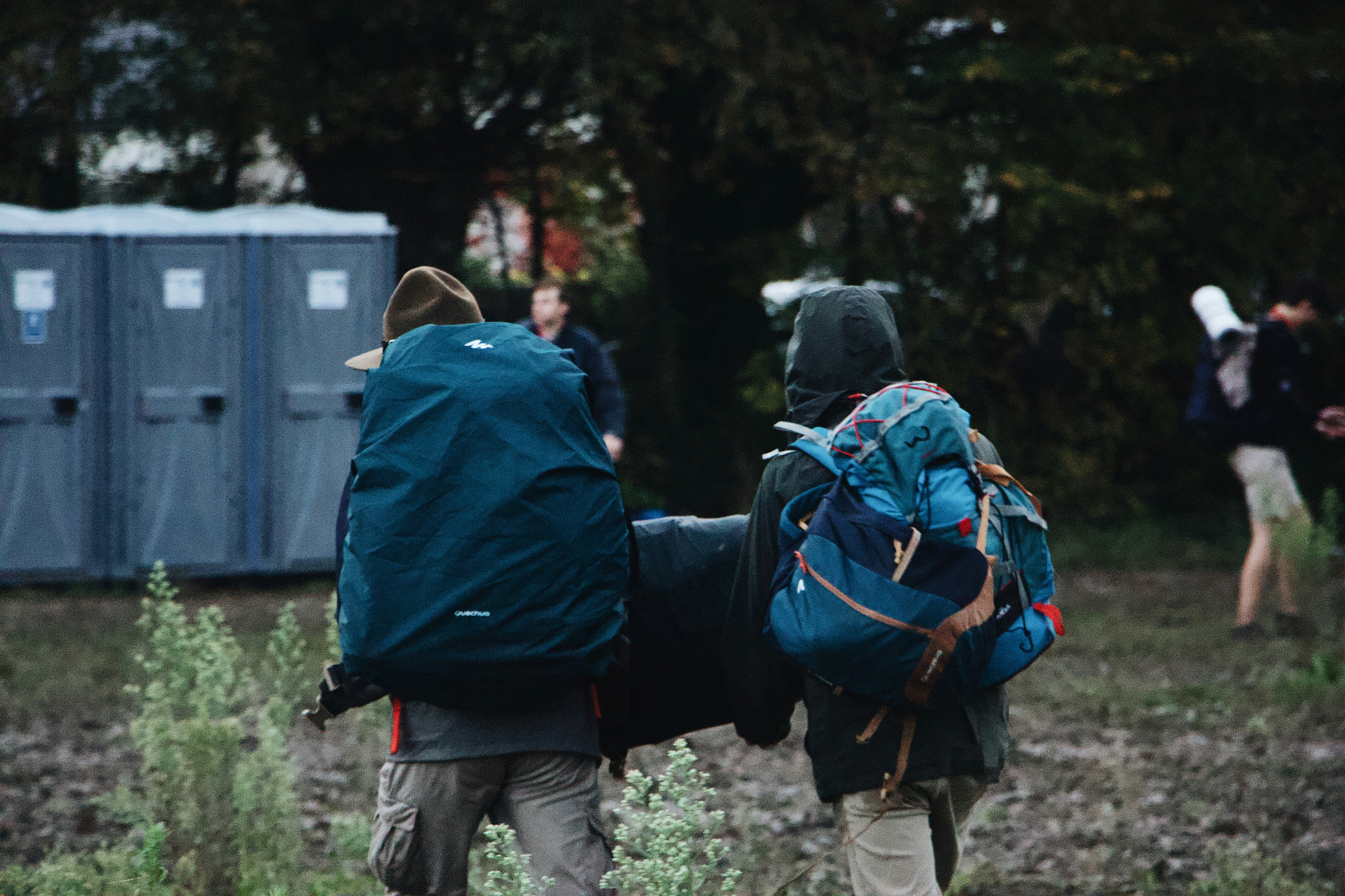 People carrying bag photo – Free Human Image on Unsplash