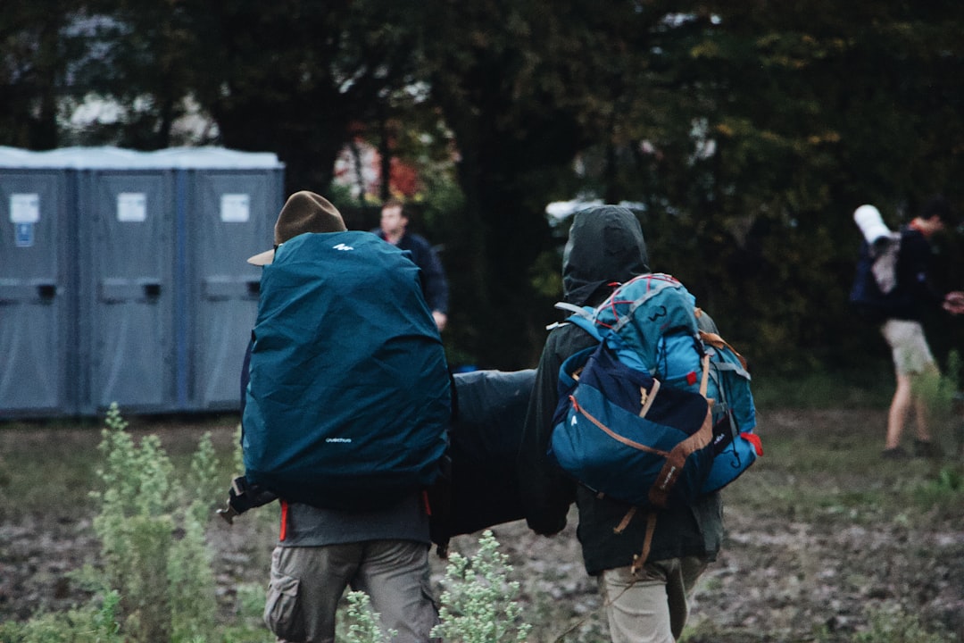 people carrying bag