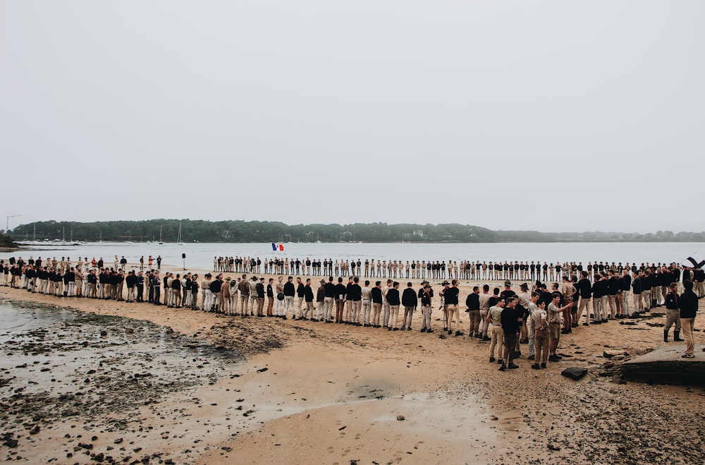 people standing on mud