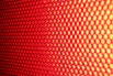 a close up of a red and yellow background