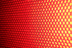 a close up of a red and yellow background