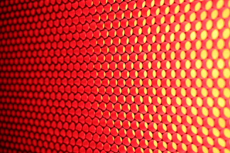 a close up of a red and yellow background
