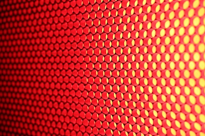 a close up of a red and yellow background