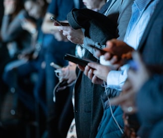 people using phone while standing