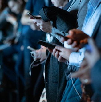 people using phone while standing