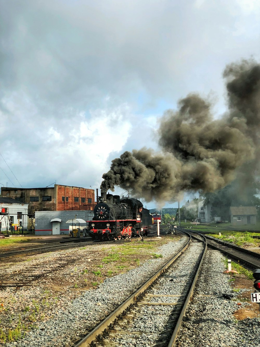 steam train crossing rail
