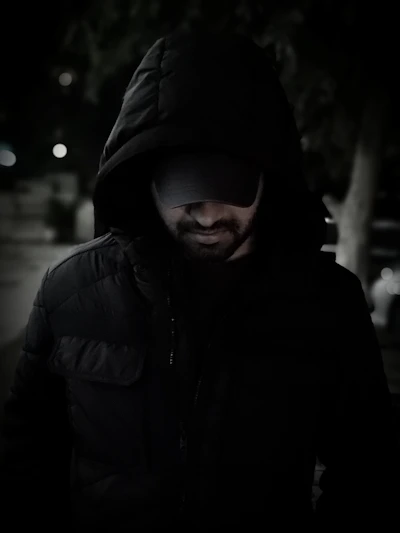man wearing black hoodie