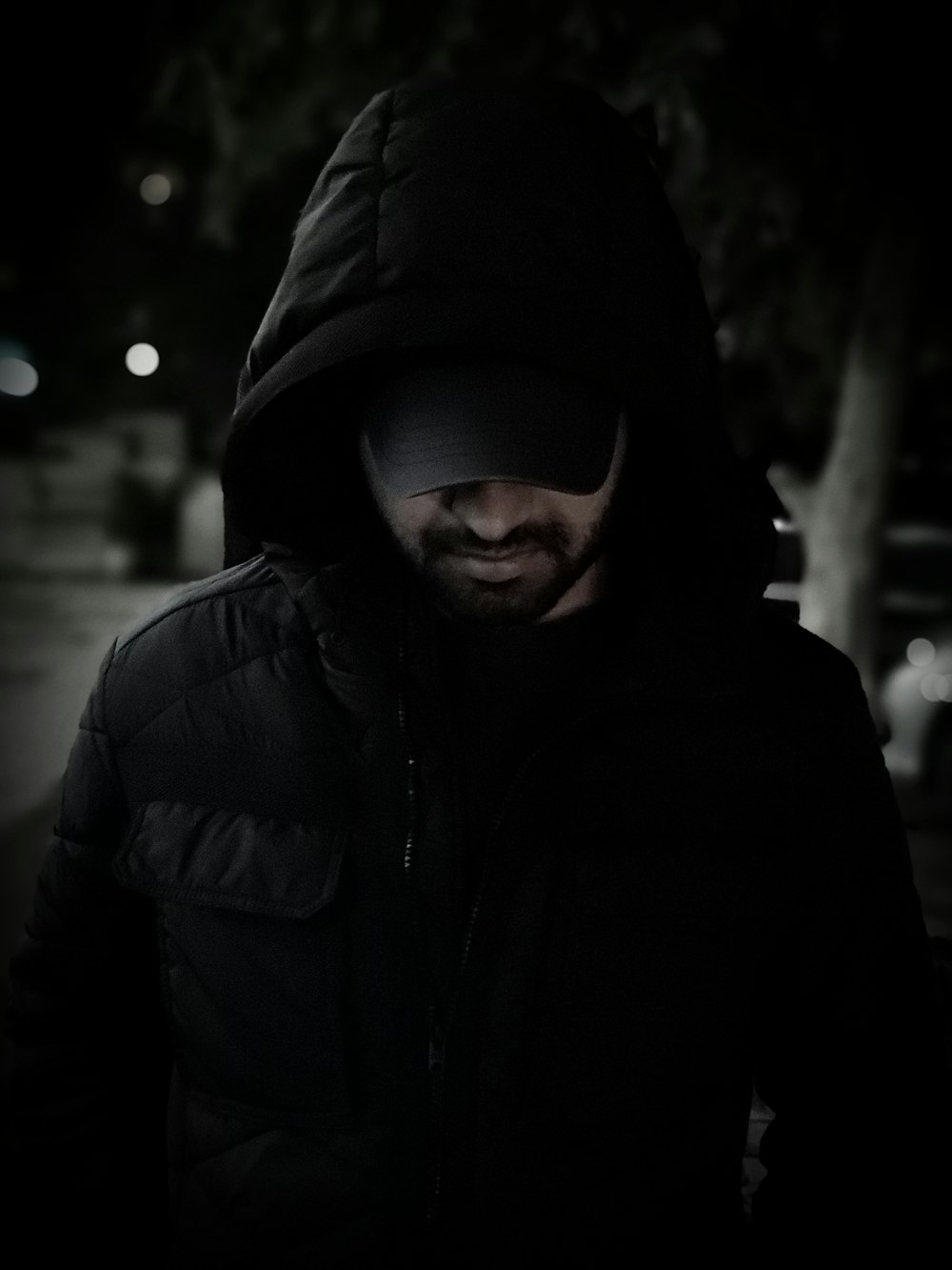 man wearing black hoodie