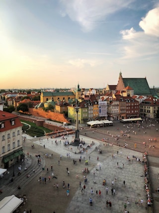 aerial photograph of people walking on town square
