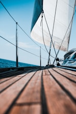 selective focus photography of blue and gray mast during daytime
