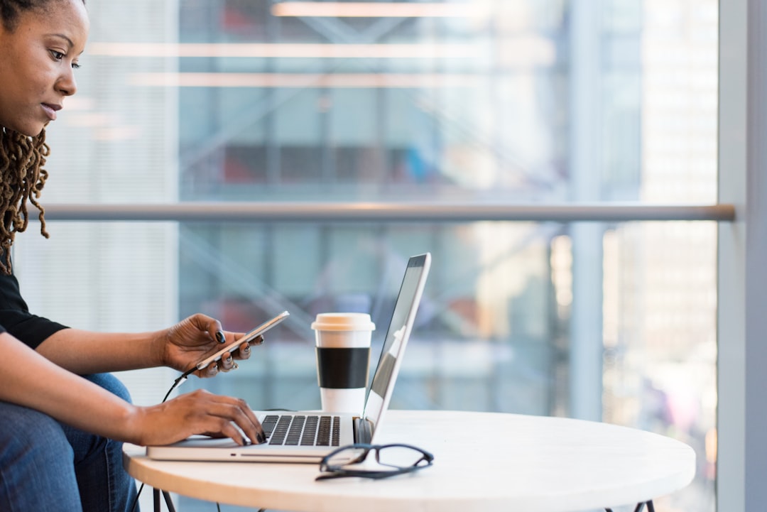 woman using MacBook