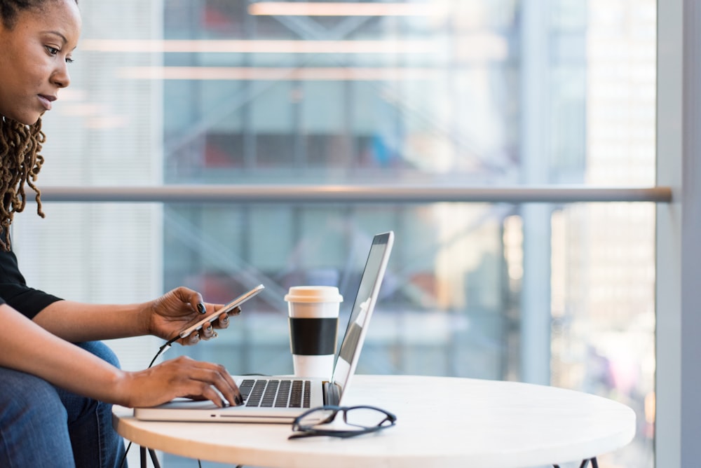 woman using MacBook