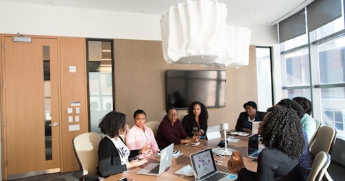 photography of people inside room during daytime