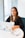 woman in black blazer using MacBook
