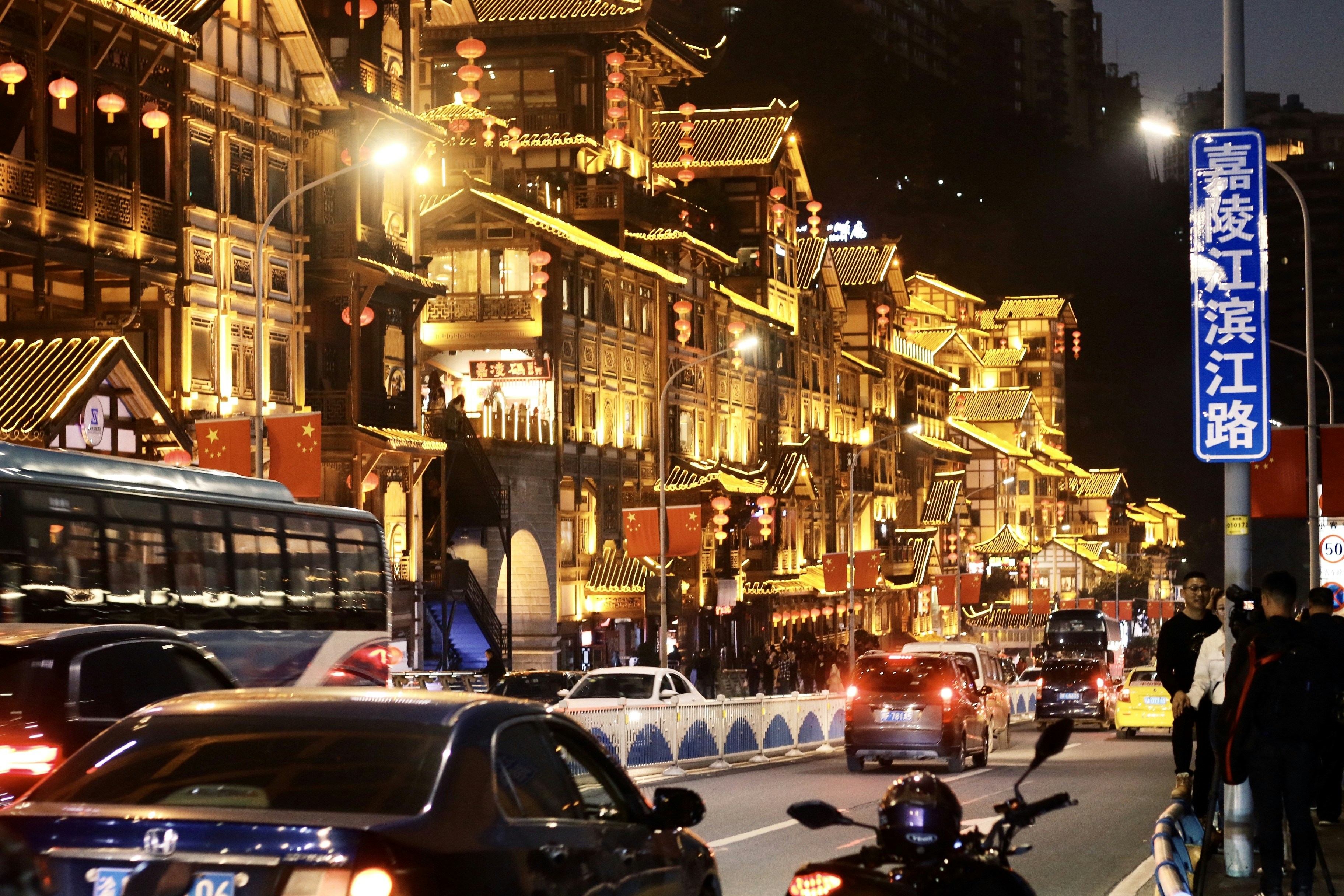 black sedan crossing on road