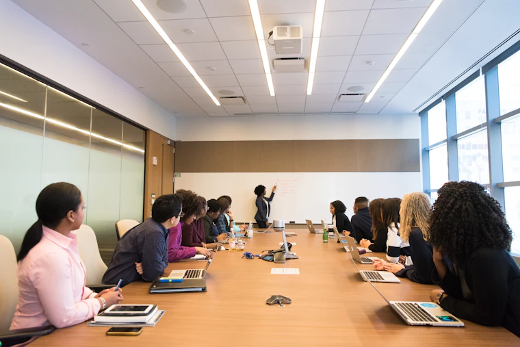 A consultancy-style meeting around a table