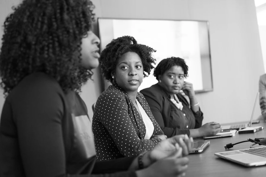 Team members in a training session, engaged and taking notes