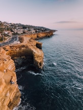 road on sea cliff during daytime