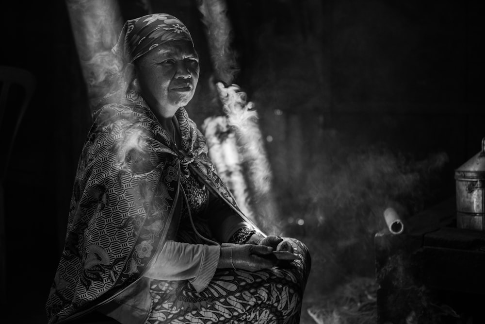grayscale photography of woman wearing robe