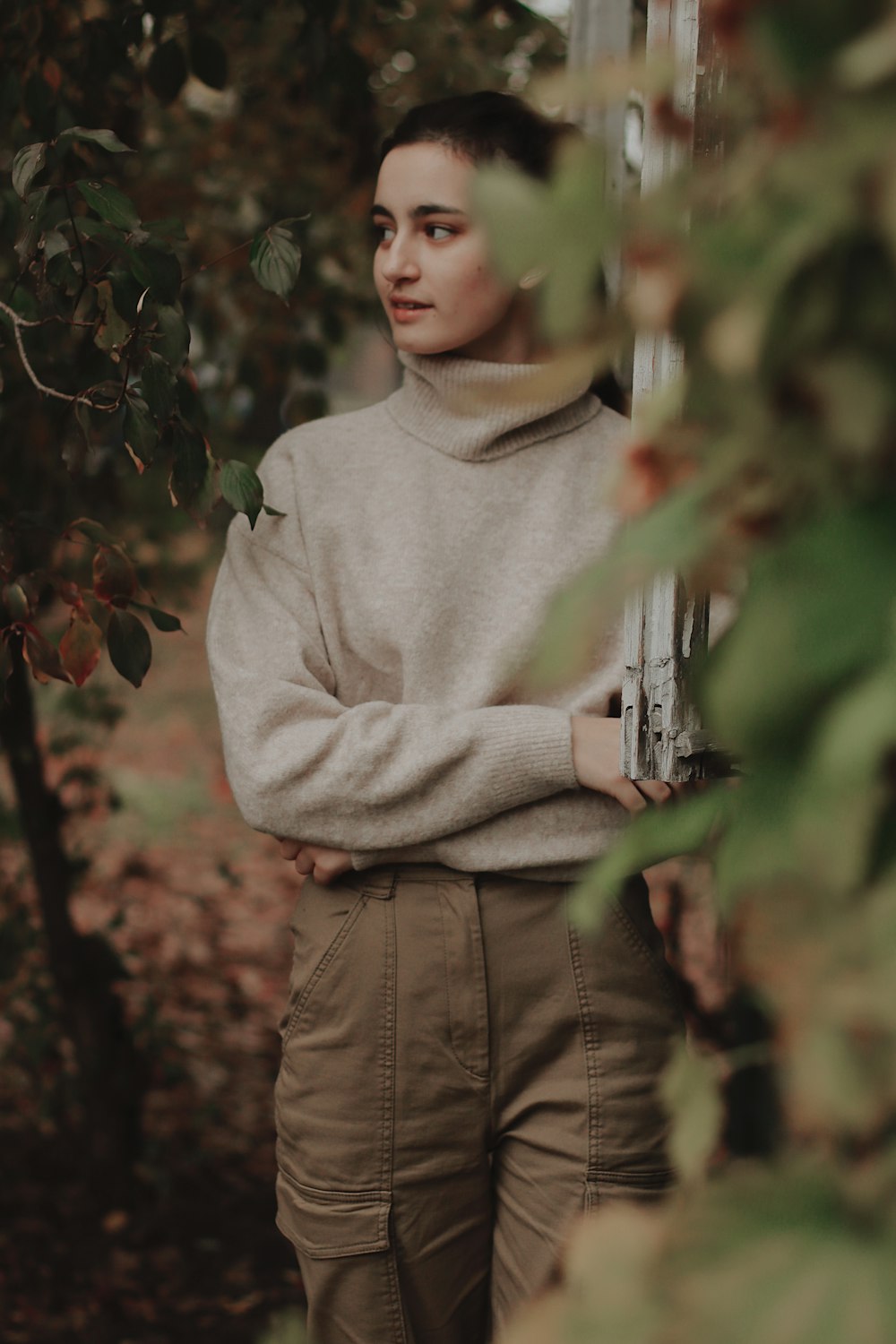 woman standing near tree