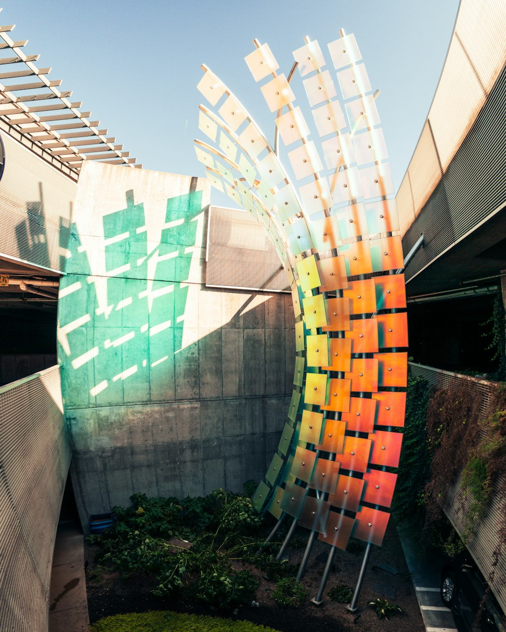 an artistic sculpture in the middle of a courtyard