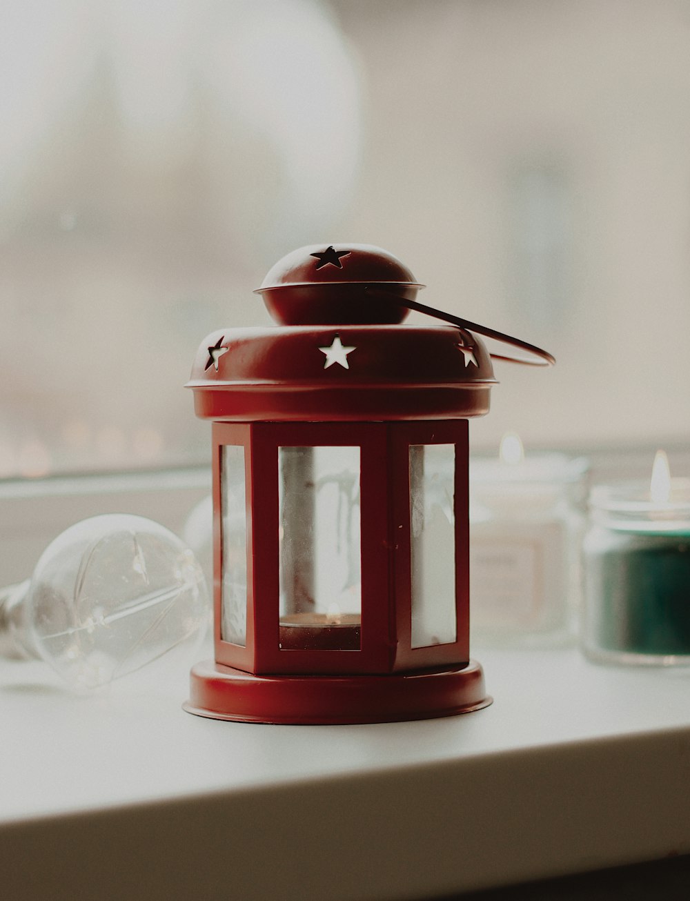 selective focus photography of red candle lantern