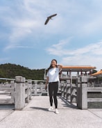 A happy person enjoying an active outdoor walk, symbolizing health and progress