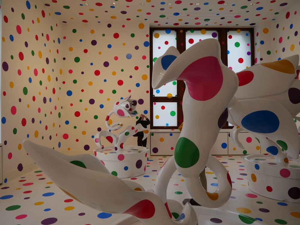 inside white and multicolored polka-dot building