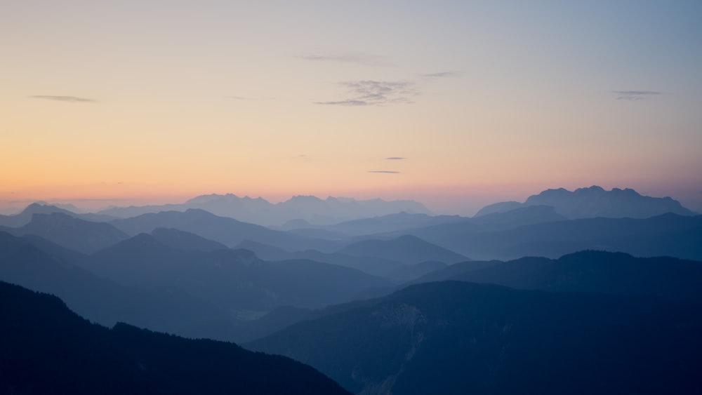 silhouette of mountain during golden hour