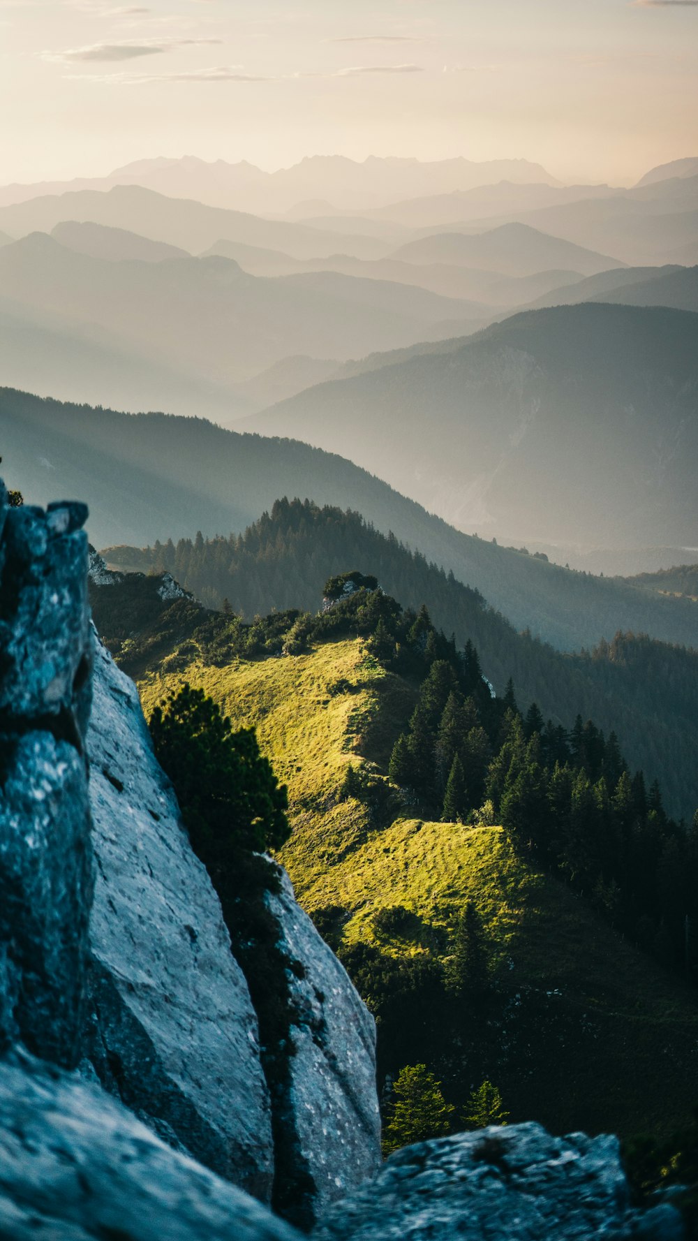 aerial photography of cliff viewing mountain during daytime